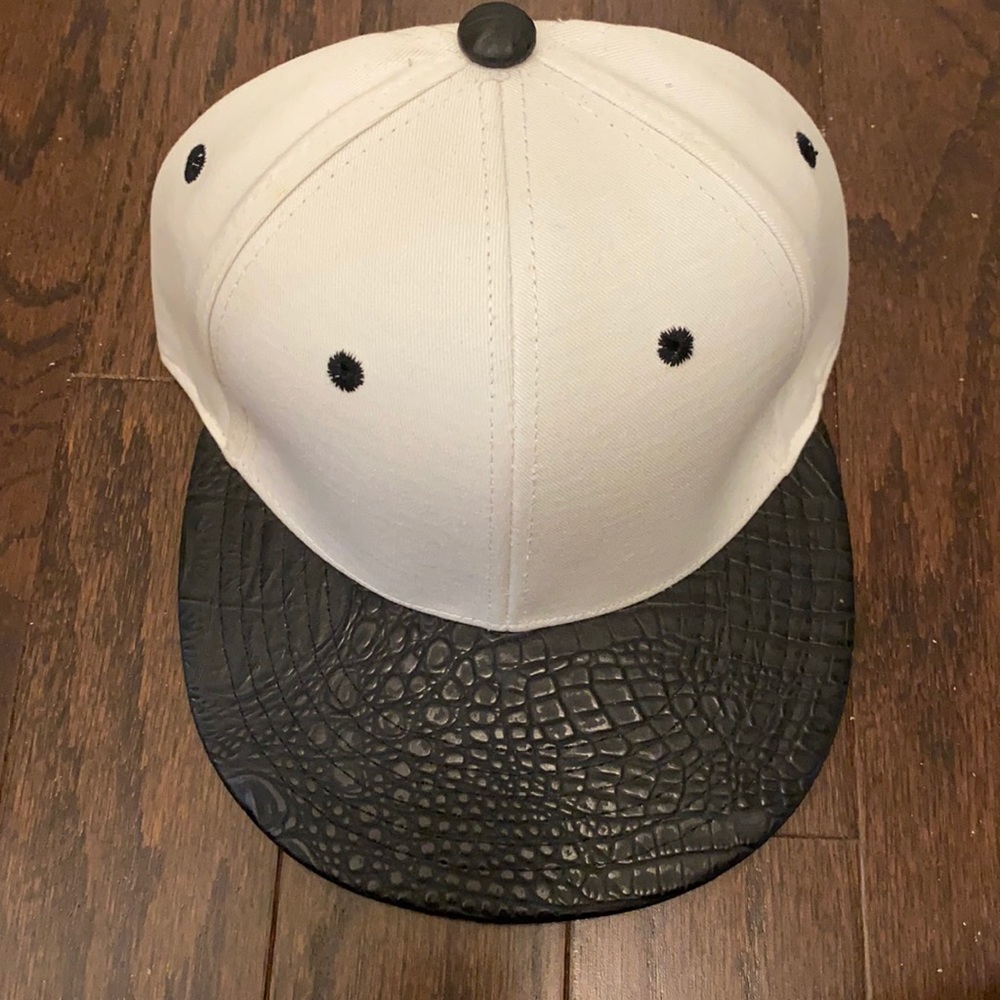 White and black faux croc hat